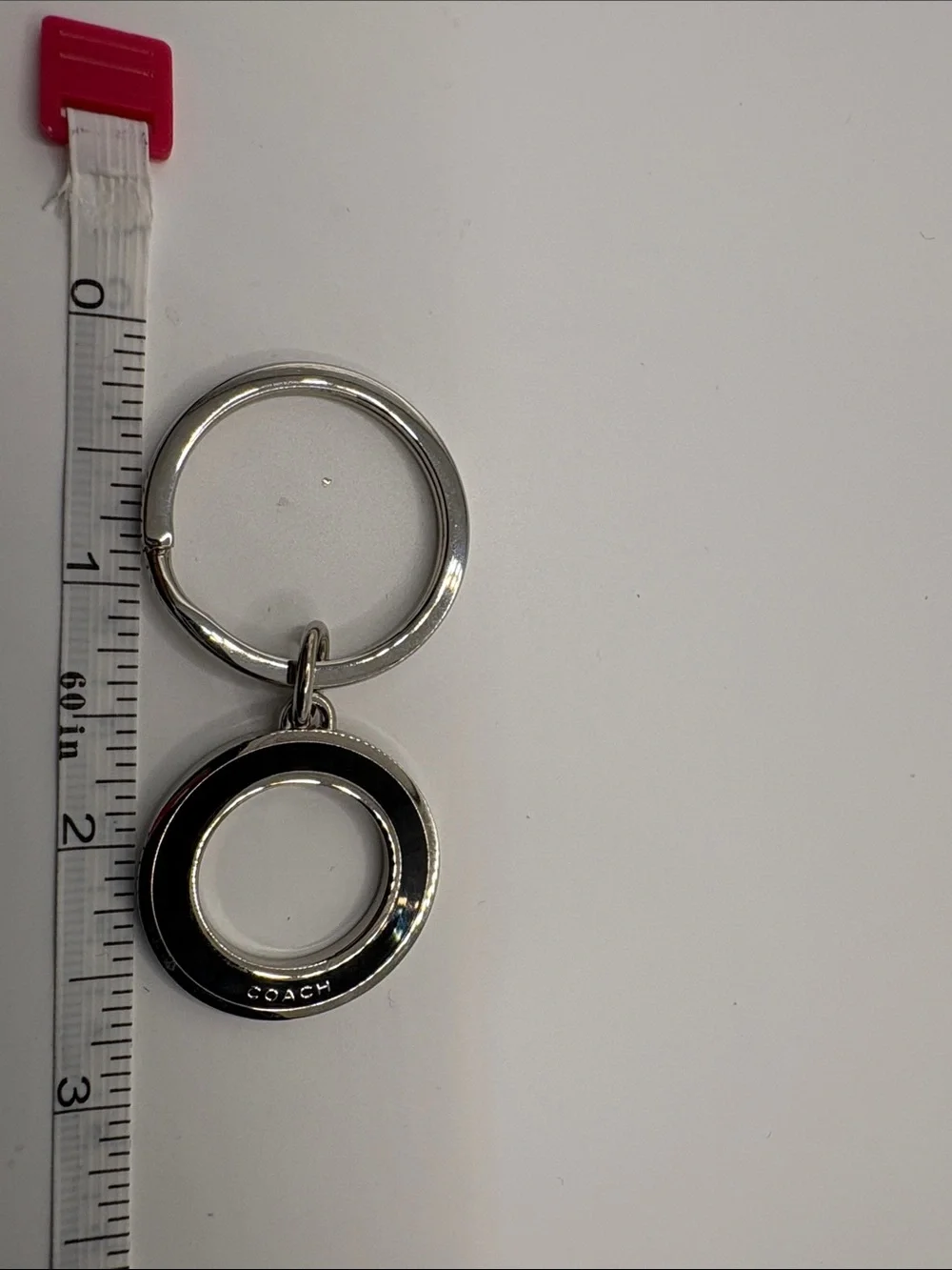 Coach Silver-Tone Round Logo Keyring with Black Accent